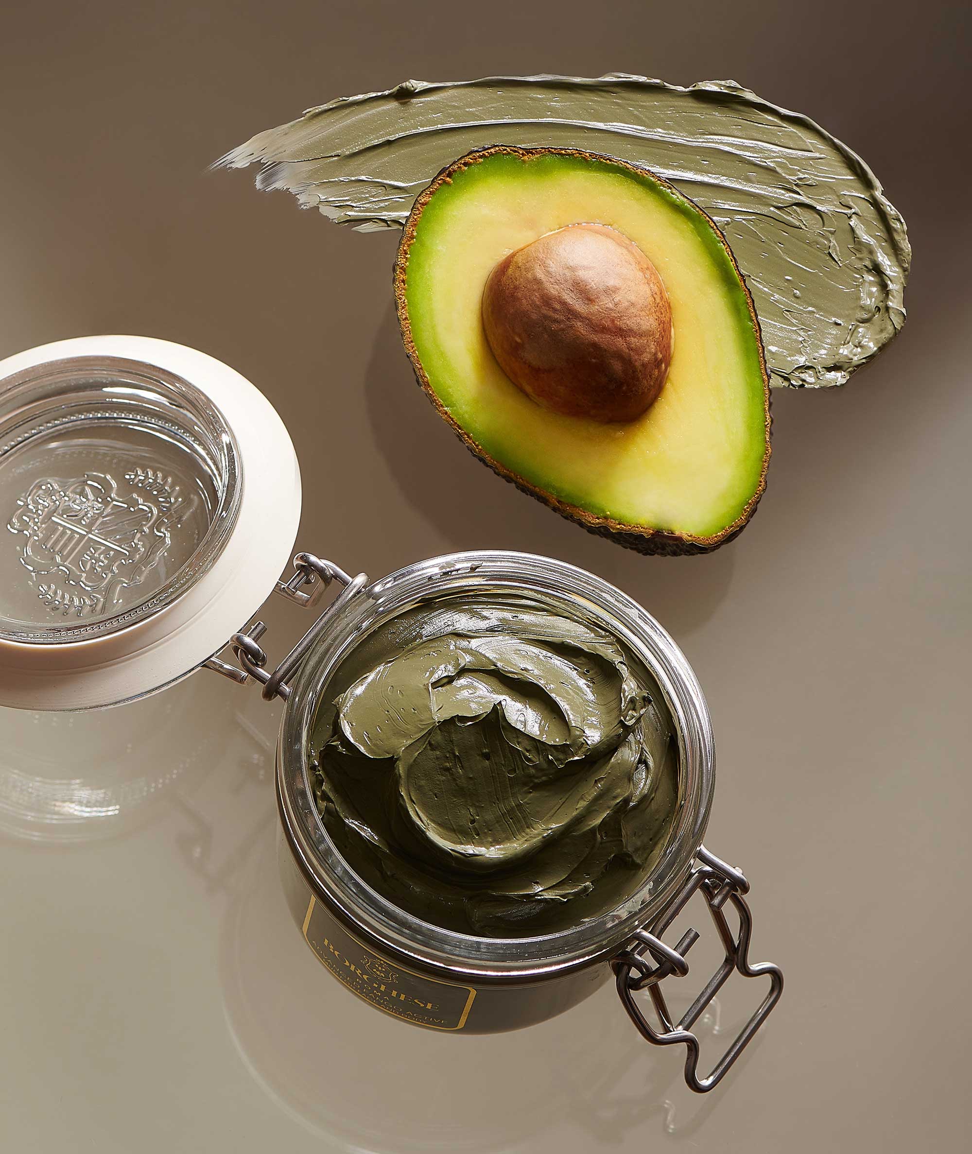 Swatch of texture of Advanced Fango Active Mud Mask with avocado and in glass jar