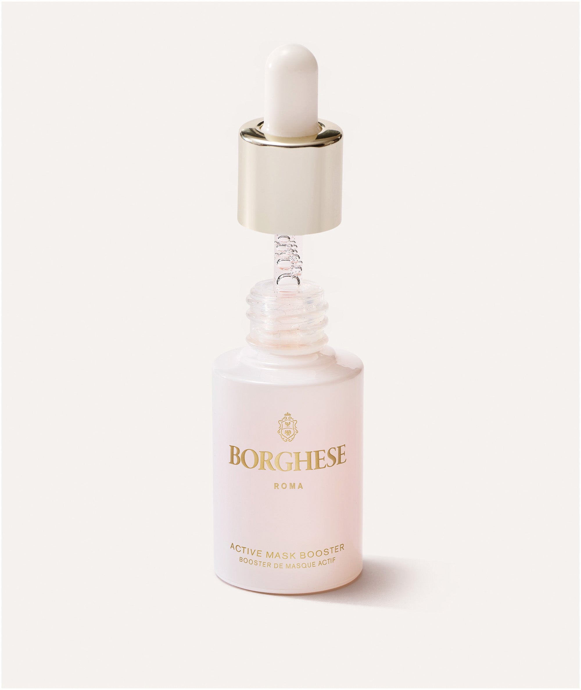 Active Mask Booster serum with applicator shown next to the bottle