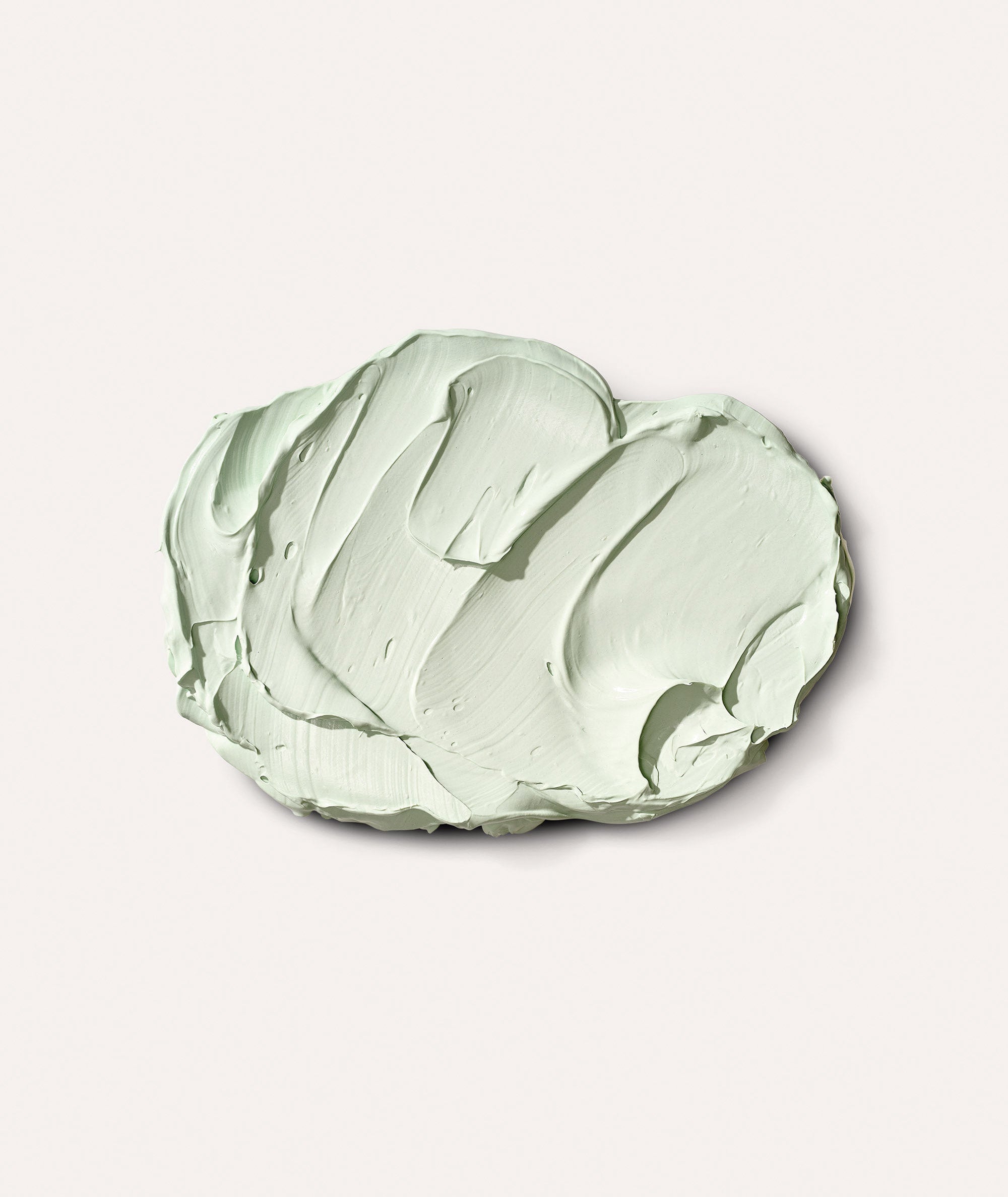 Product swatch showing the mint green color and thick luxurious mud texture of our Advanced Fango Delicato Mud Mask