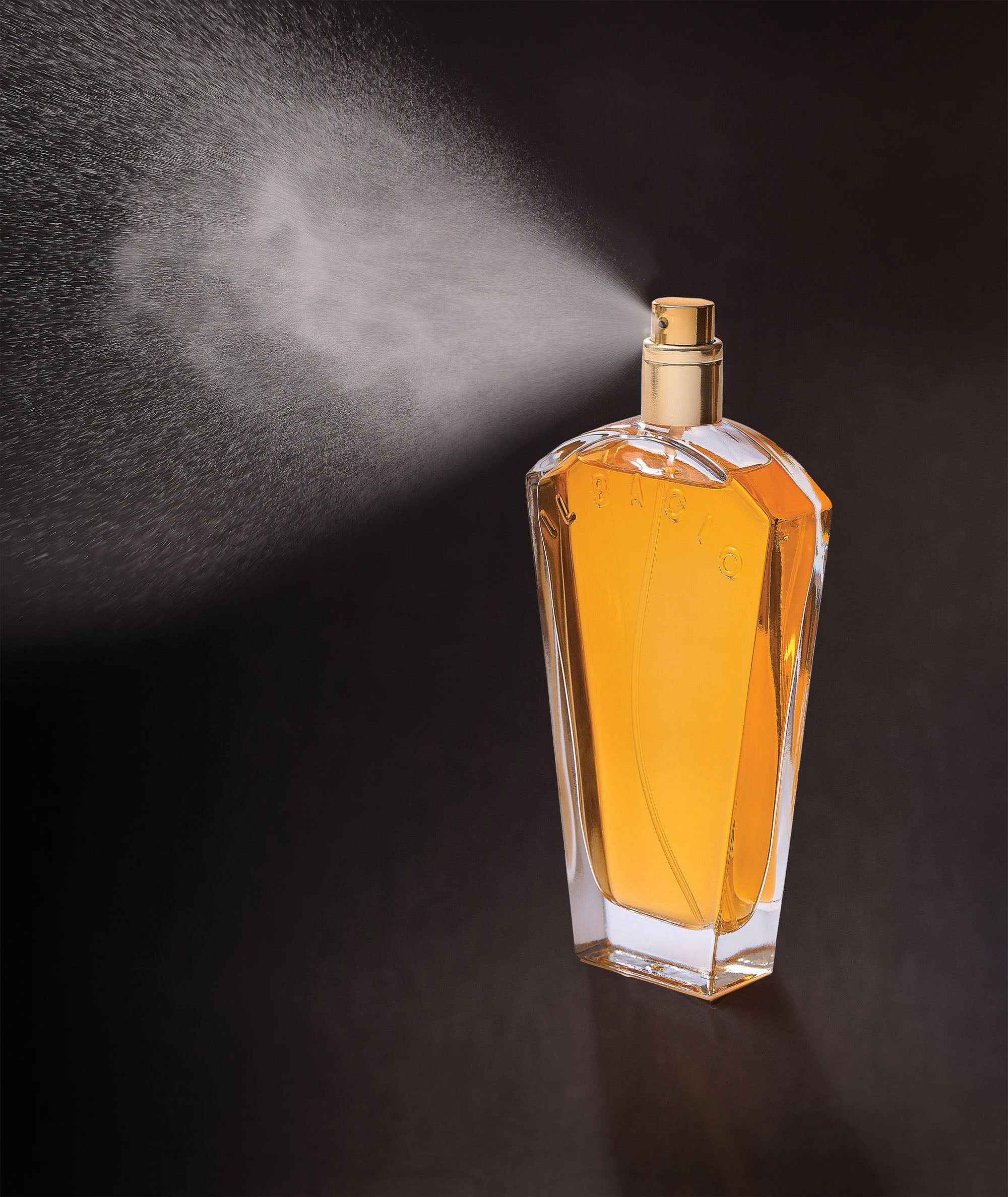 Image showing the mist and bottle of Il Bacio Fragrance 