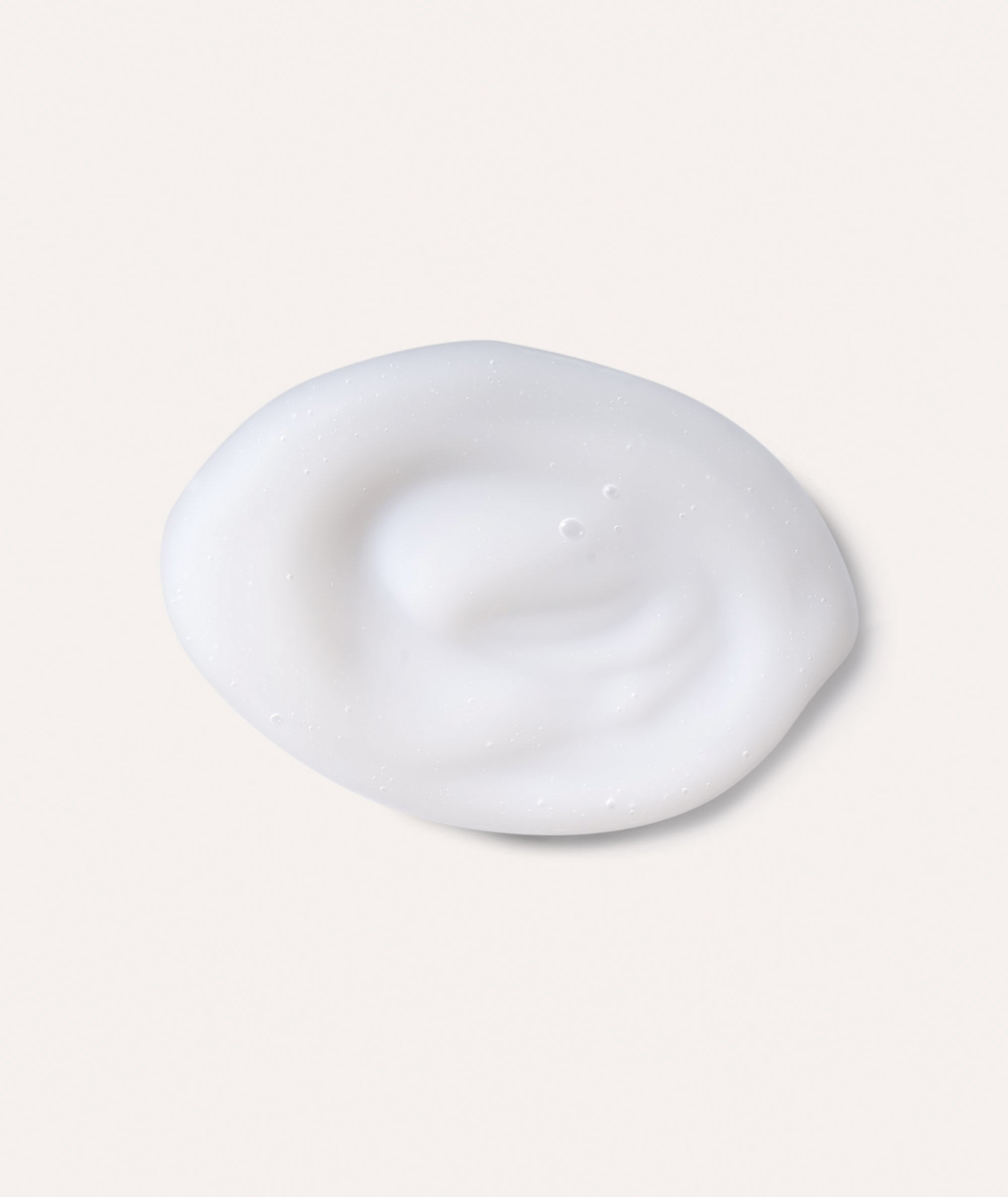 Product swatch showing the white color and smooth texture of  Insta-Firm Advanced Wrinkle Relaxer