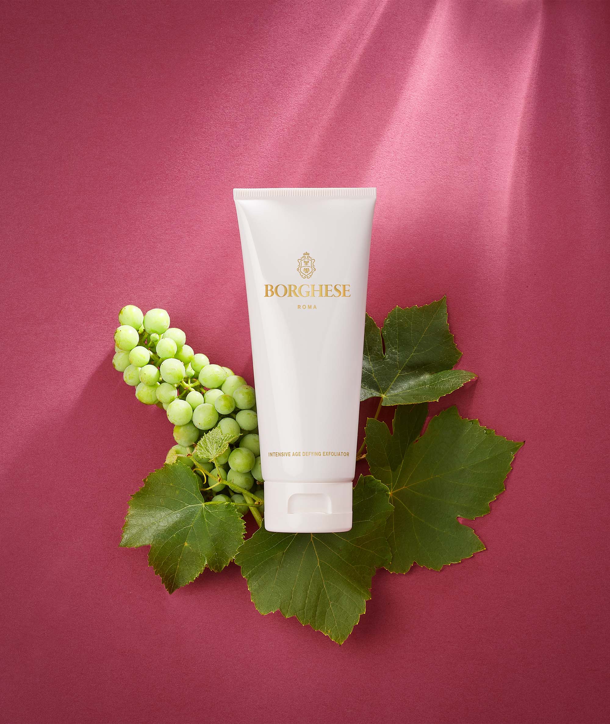 Product shot with ingredients of Intensive Age Defying Exfoliator showing stem cell extracts and hyaluronic acid