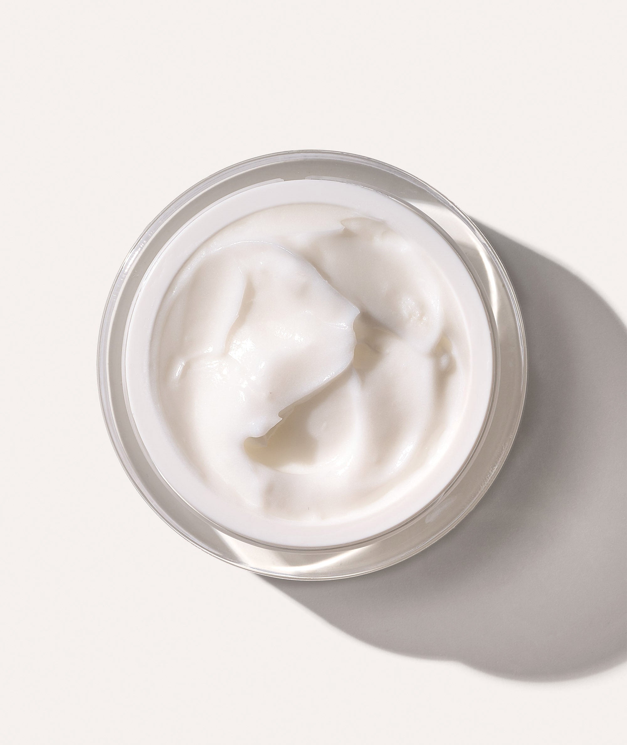 Aerial view of jar open showing the rich texture of Occhi Ristorativo Eye Creme