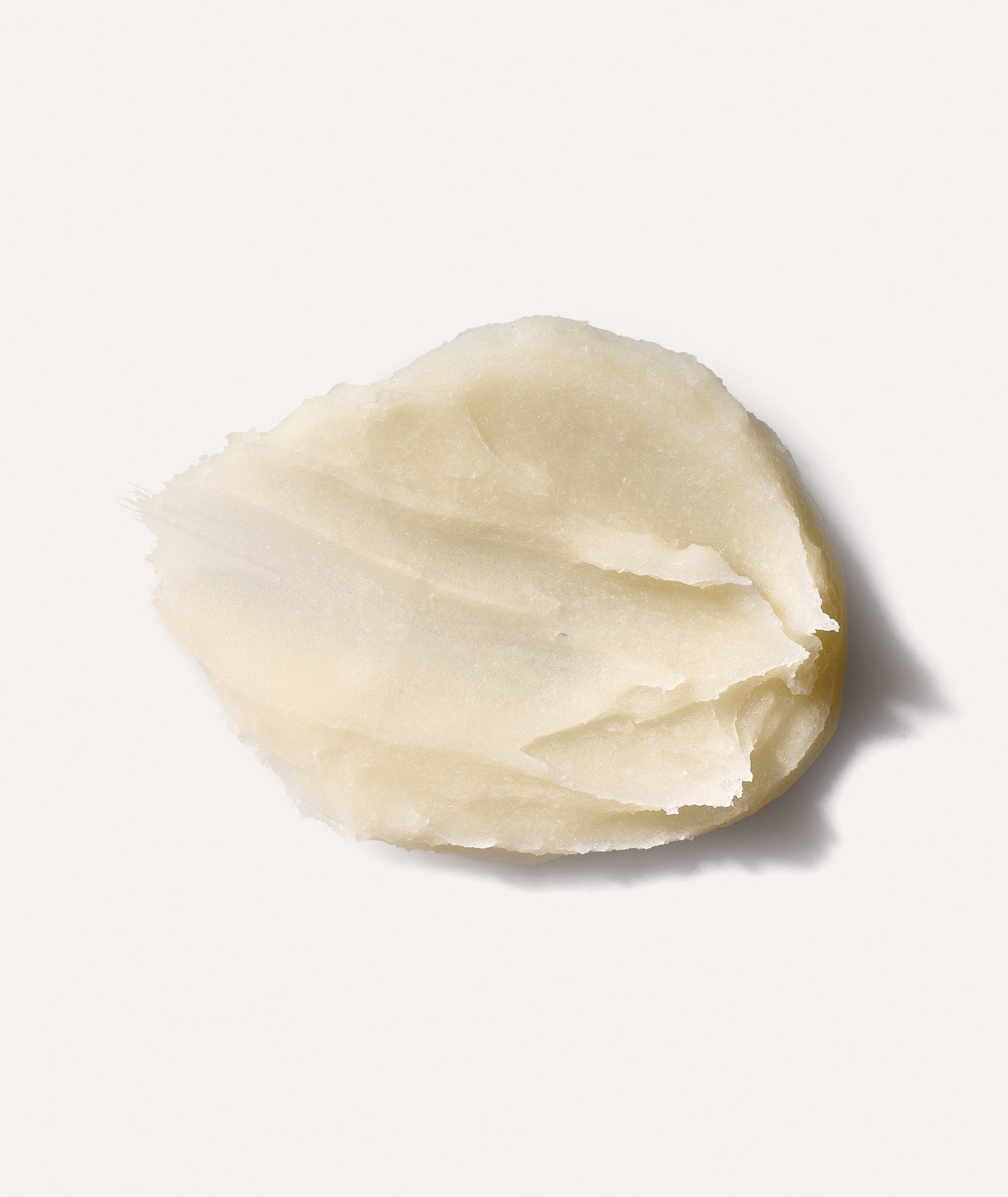 Product swatch showing the beige color and thick texture of our Rinfrescante Sugar Body Polish  